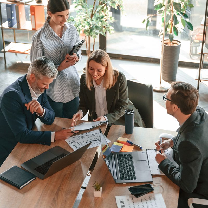 Team meeting to review deal pipeline analytics