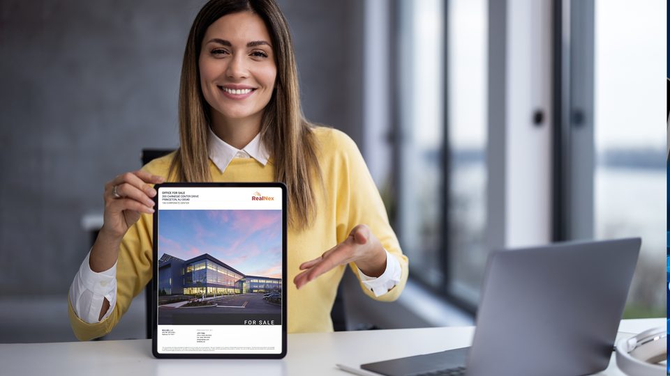 Investment sales broker presenting commercial real estate offering memorandum created with RealNex MarketEdge