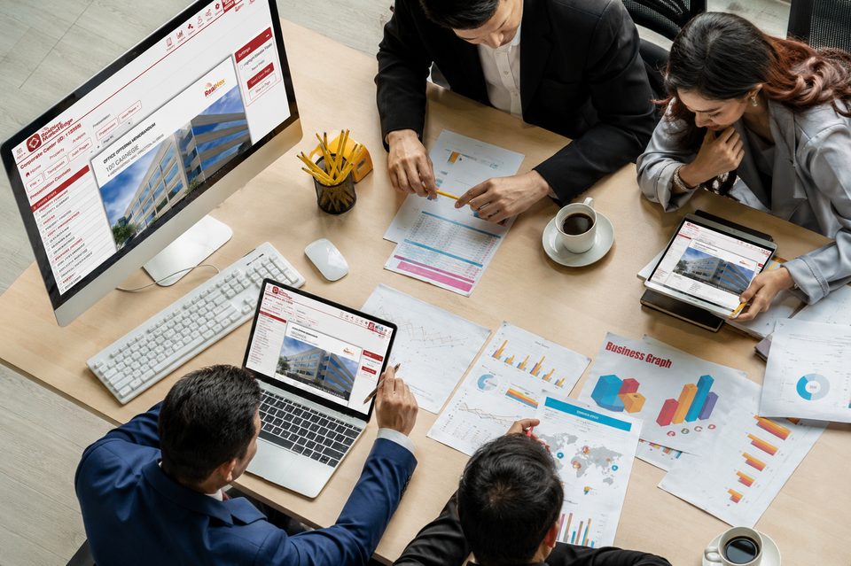 Commercial real estate marketing professional creating branded property flyer and campaign using RealNex