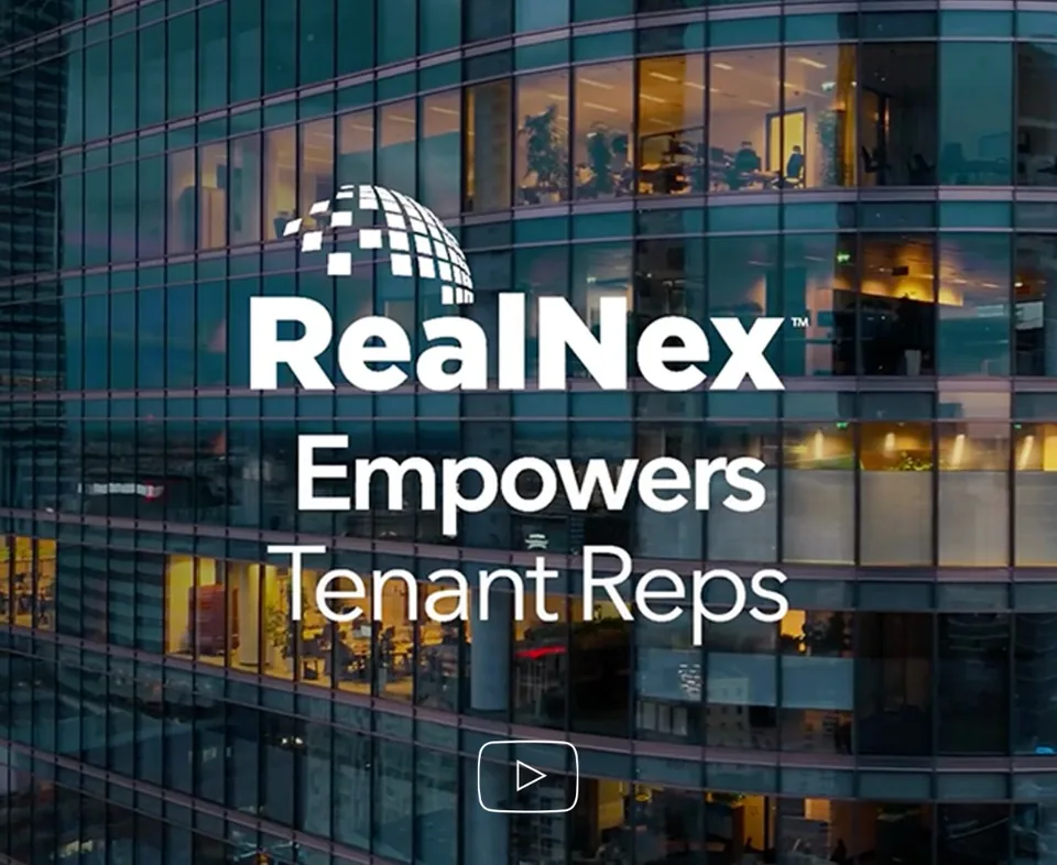 Tenant rep broker and client reviewing digital commercial real estate tour book created with RealNex Bridge