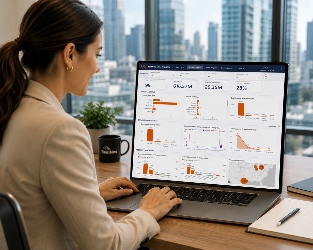 Commercial real estate team reviewing key activity metrics on a laptop dashboard
