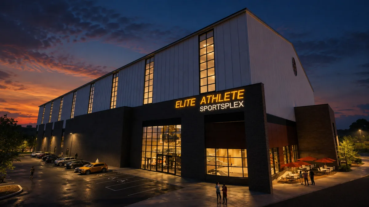 RealNex Visuals photorealistic nighttime exterior rendering of the Elite Athlete Training Sportsplex